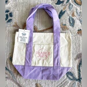Trader Joe’s mini Canvas purple shopping tote bags.